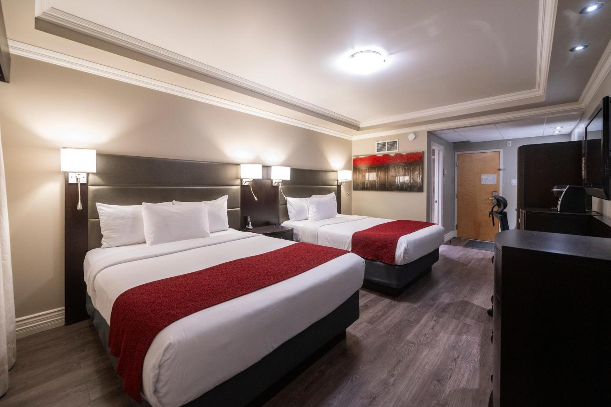 Hotel & Suites Le Dauphin Дрюммондвилл Экстерьер фото