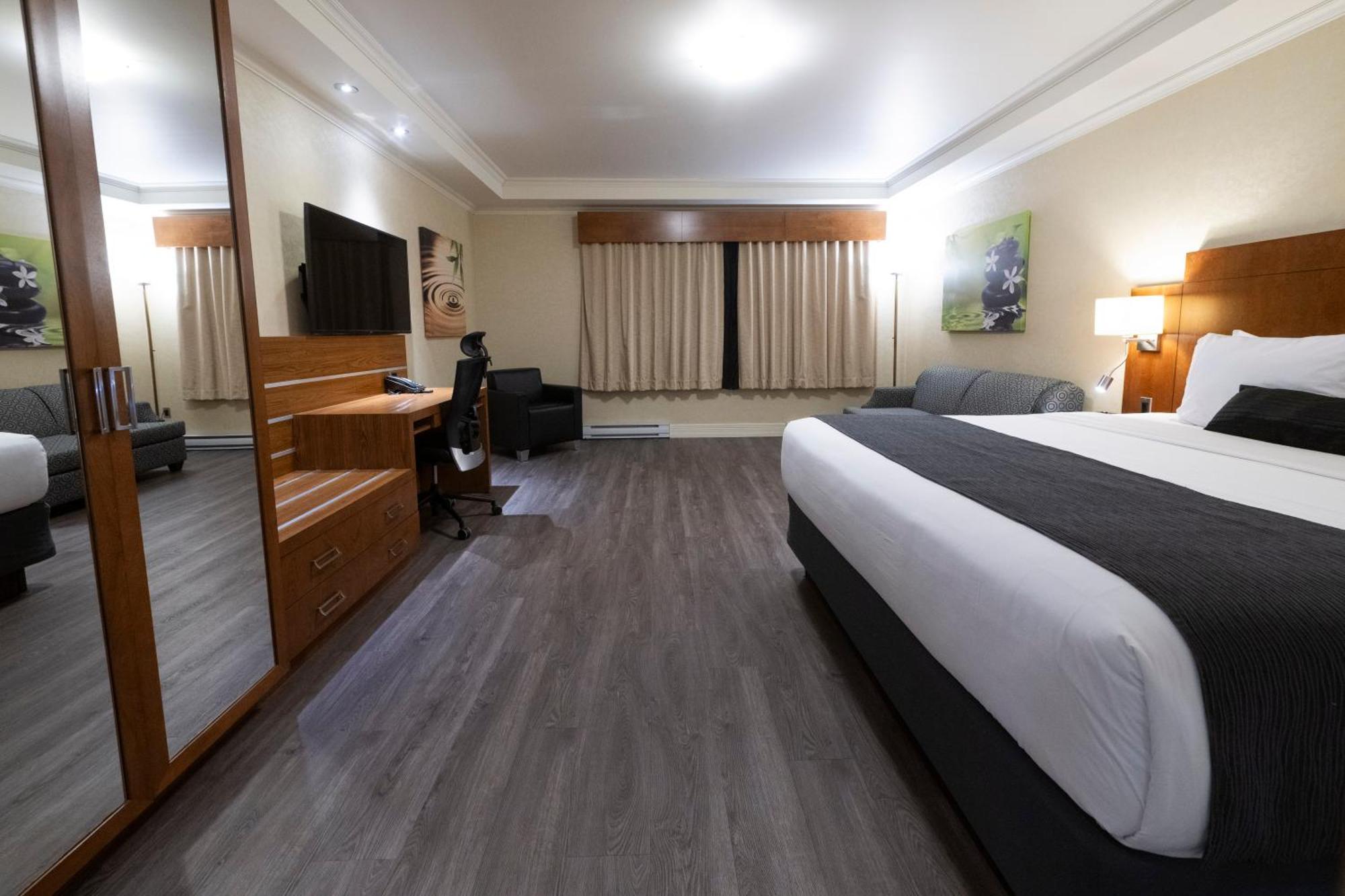 Hotel & Suites Le Dauphin Дрюммондвилл Экстерьер фото