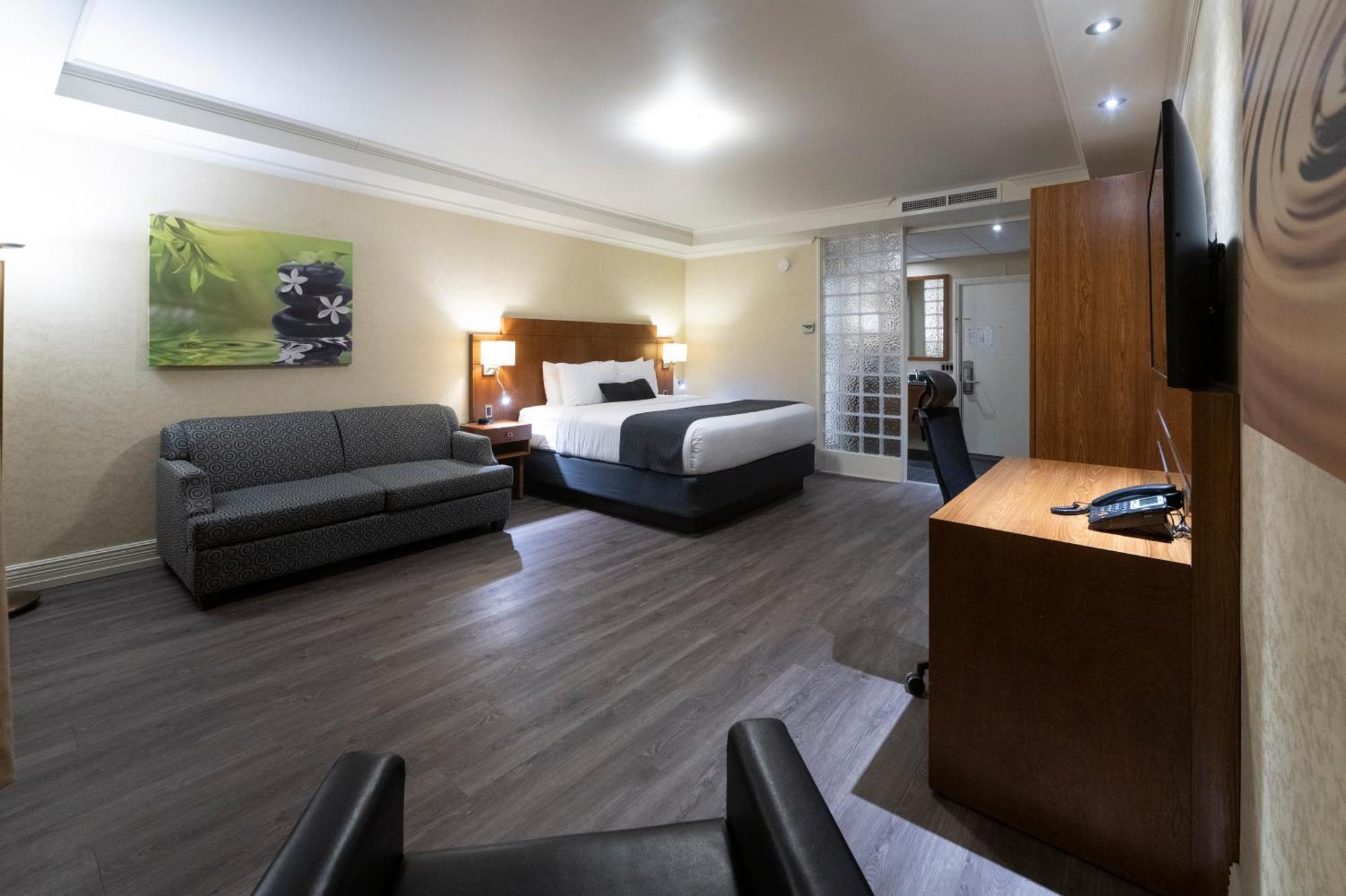 Hotel & Suites Le Dauphin Дрюммондвилл Экстерьер фото
